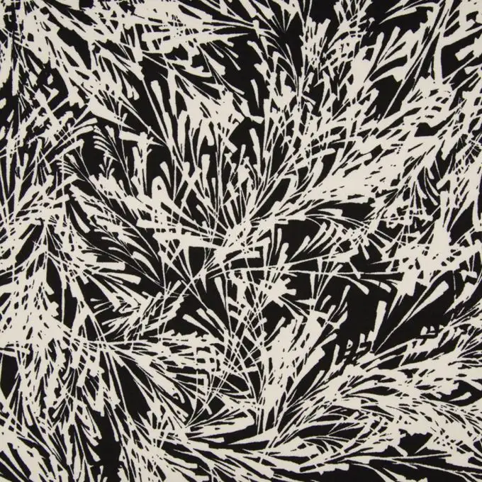 Tessuto velo di crepe poliestere nero fogliame