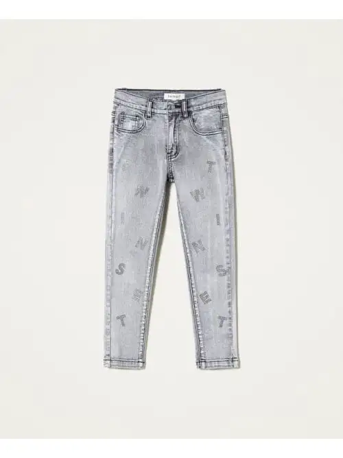 SKINNY IN DENIM DELAVATO CON APPLICAZIONI