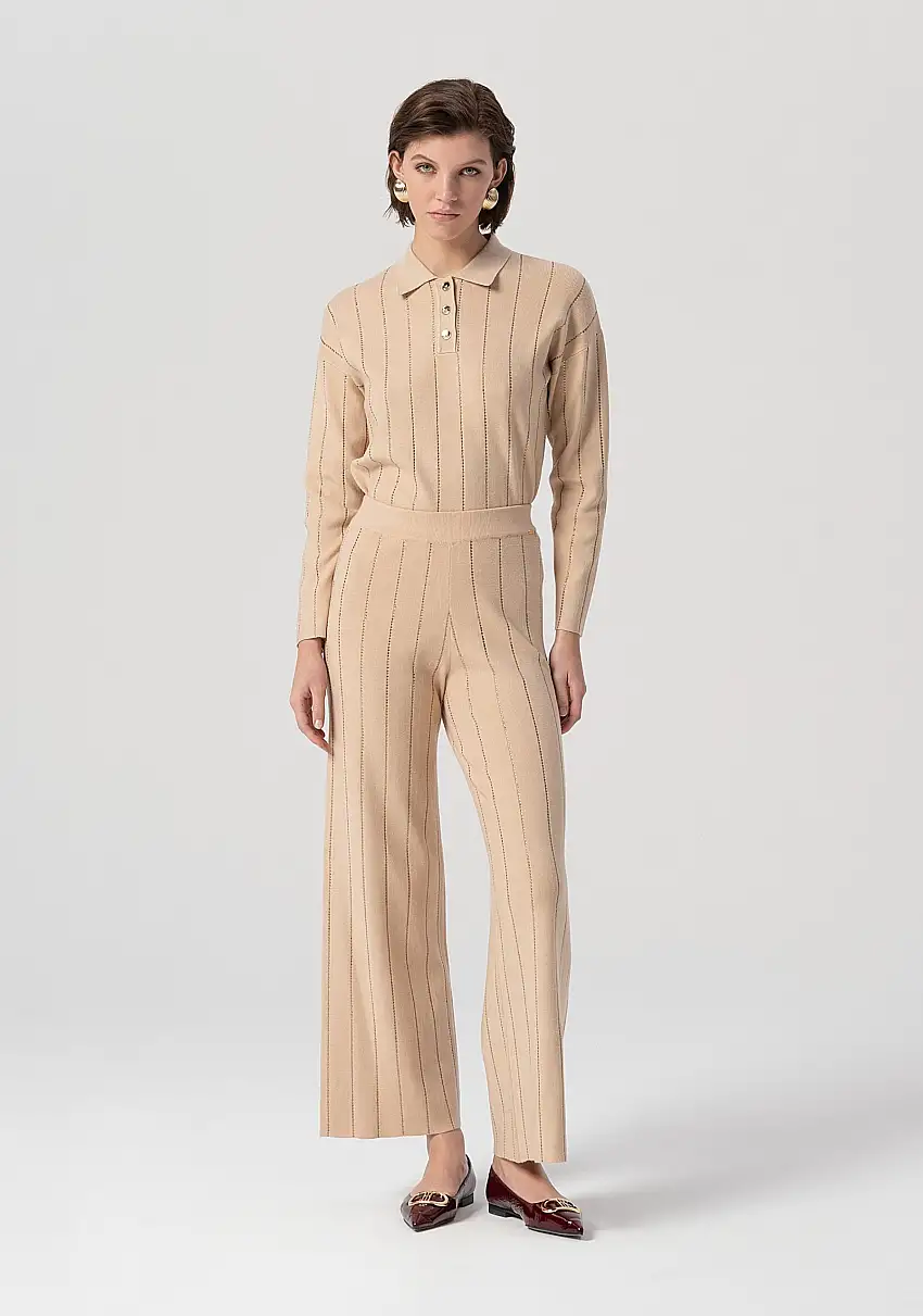 Pantalone flare a palazzo in maglia a coste con strass applicati