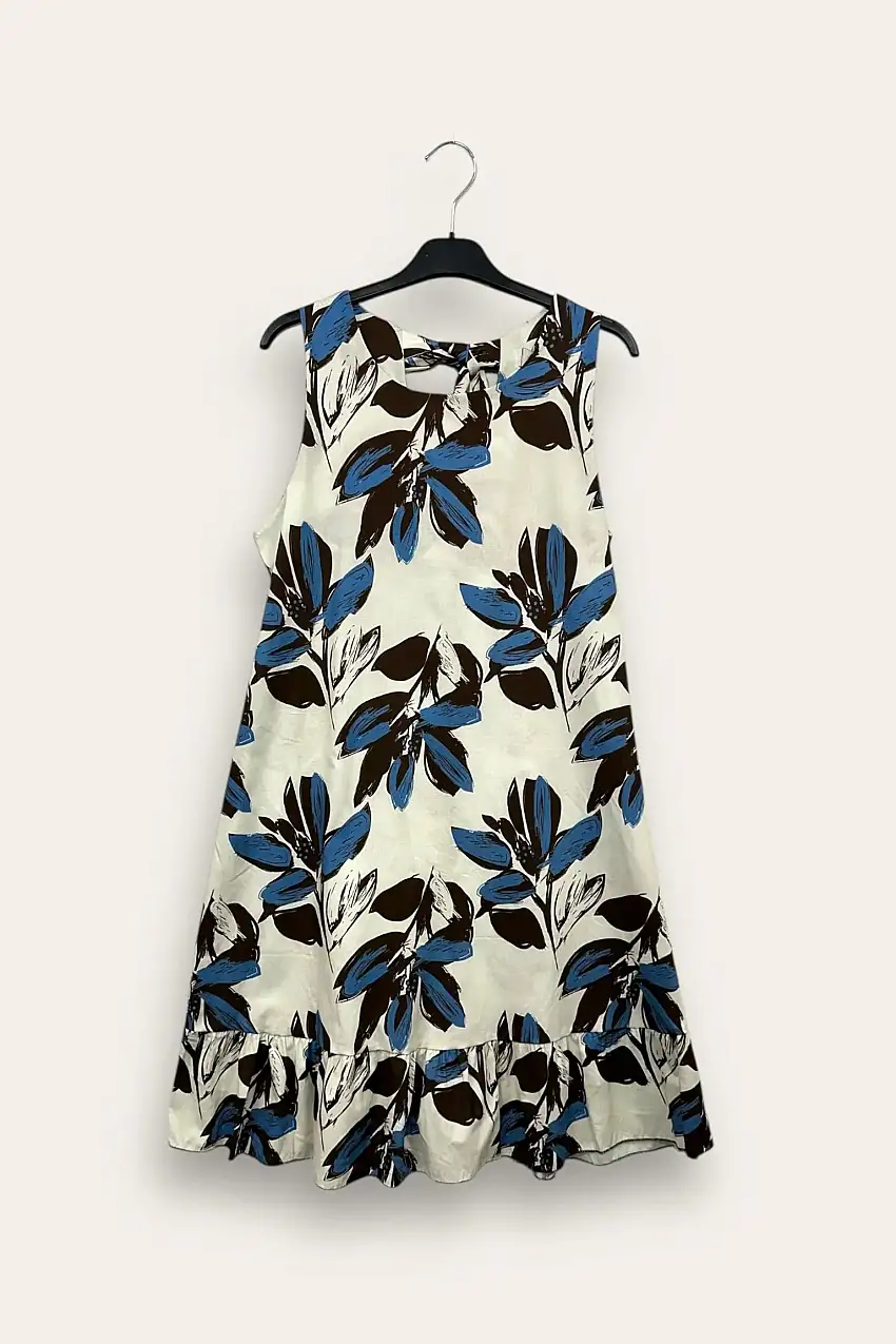 Abito in fantasia con fiocco dietro il collo