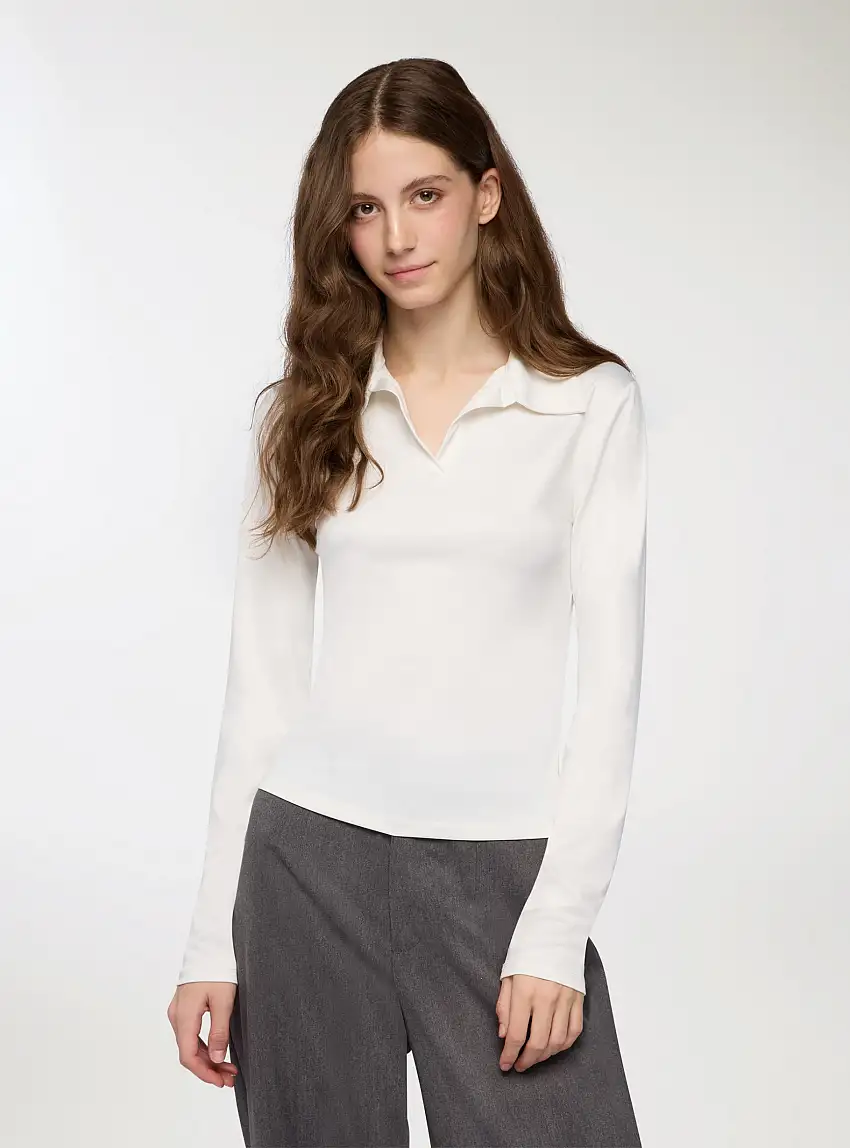 Polo elasticizzata tinta unita Bianco lana