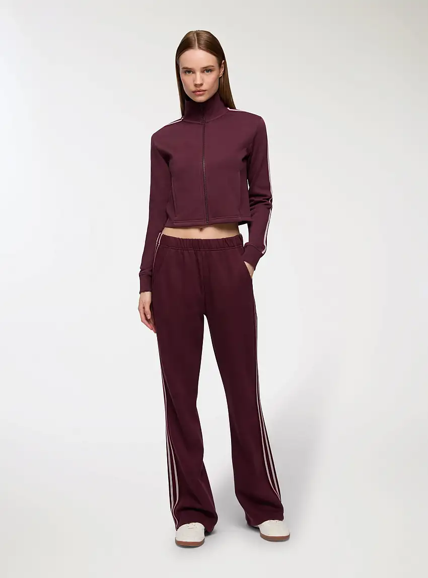 Pantaloni tuta wide leg con bande Prugna