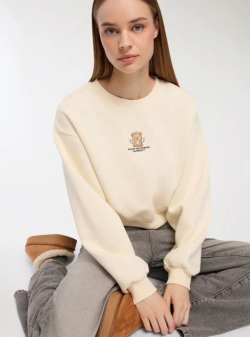 Felpa crop con orsetto e scritta girocollo Avorio