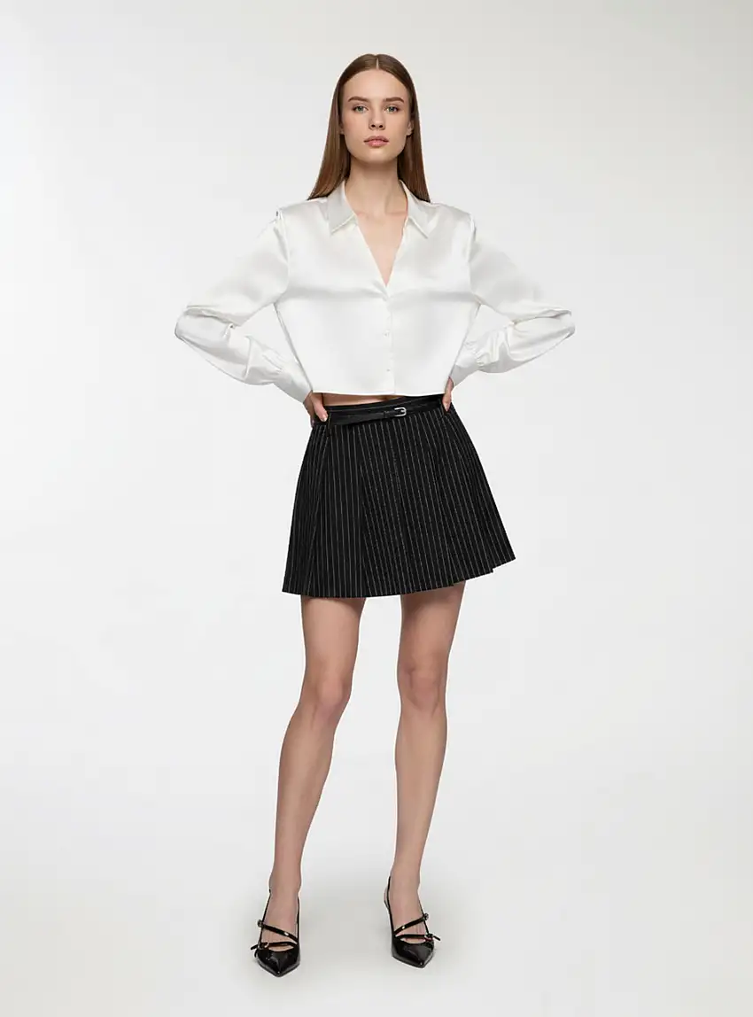 Skort a pieghe con cintura Nero