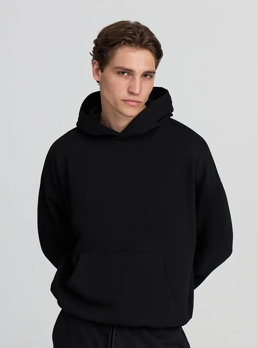 Felpa boxy fit con cappuccio Nero