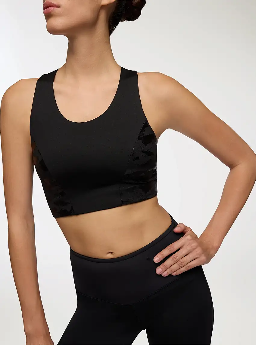 Top sportivo con inserti effetto luccicante Nero