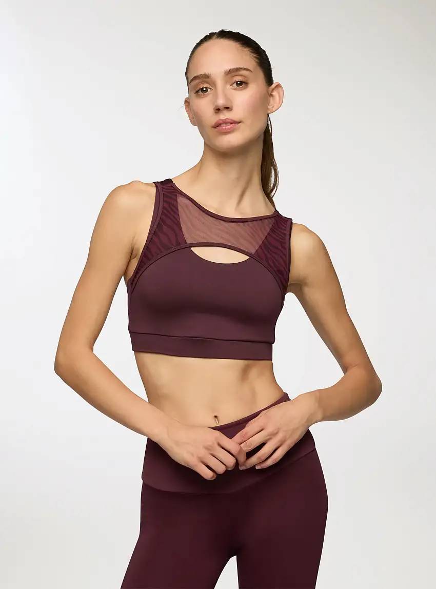 Top sportivo con trasparenze Prugna