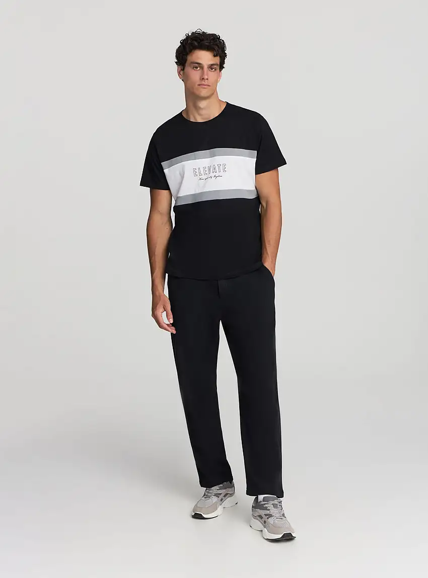 T-shirt block color con scrittta Nero