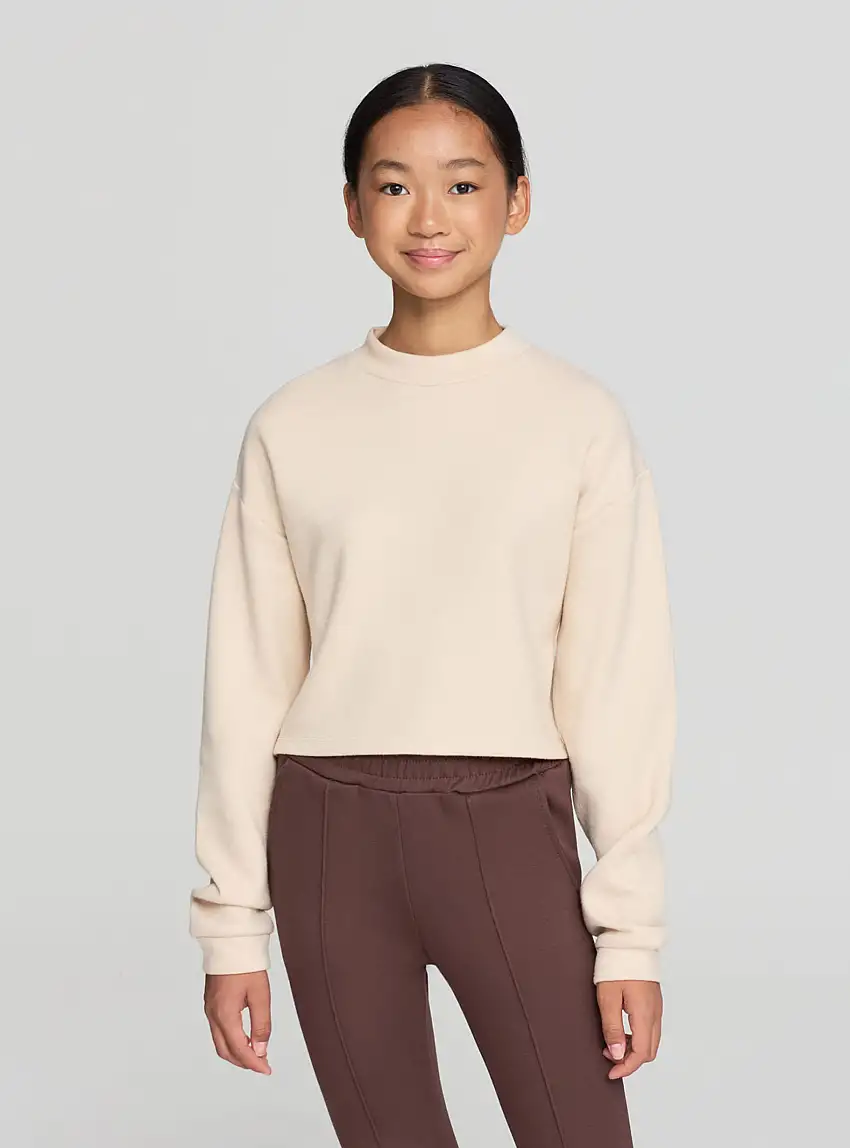 Maglietta crop con collo lupetto Nude chiaro