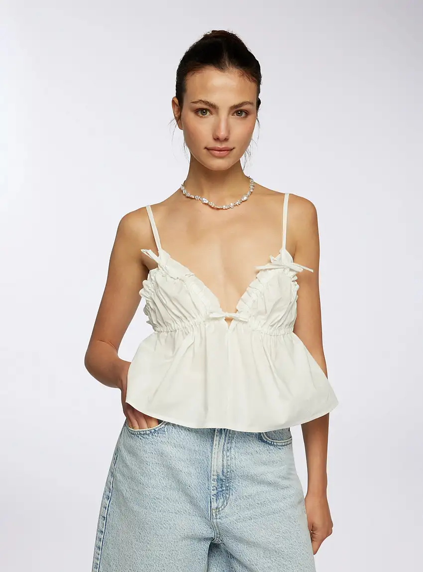 Top con spalline sottili e fiocchetti Bianco