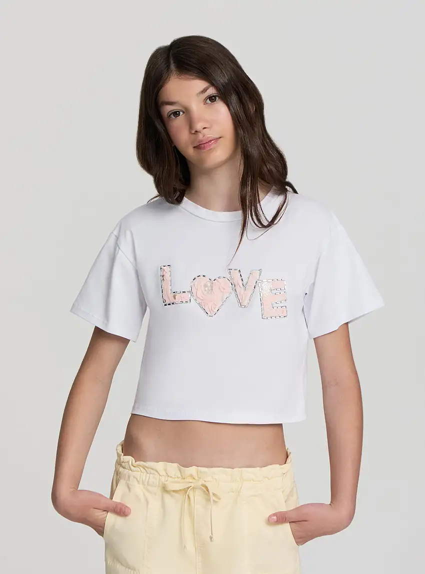 T-shirt crop con scritta effetto petali Bianco