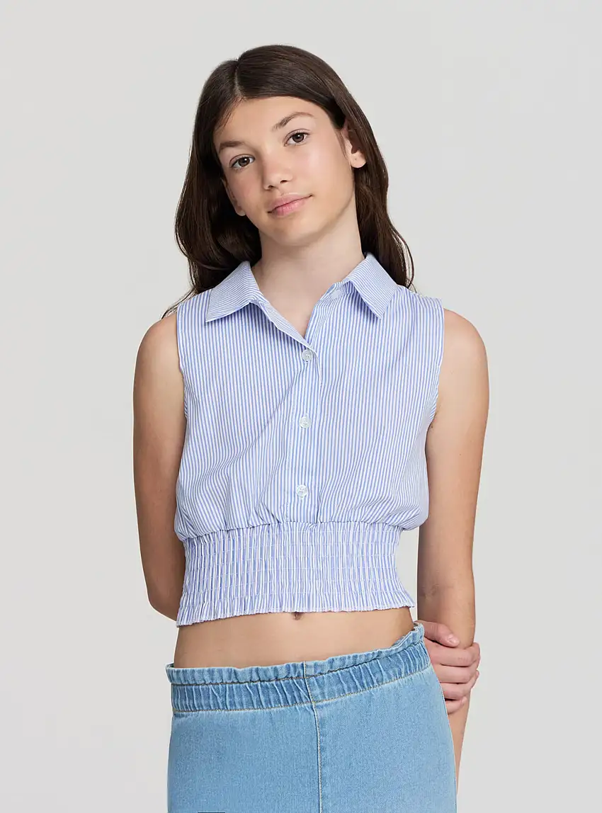 Camicia smanicata a righe con elastico in vita Celeste