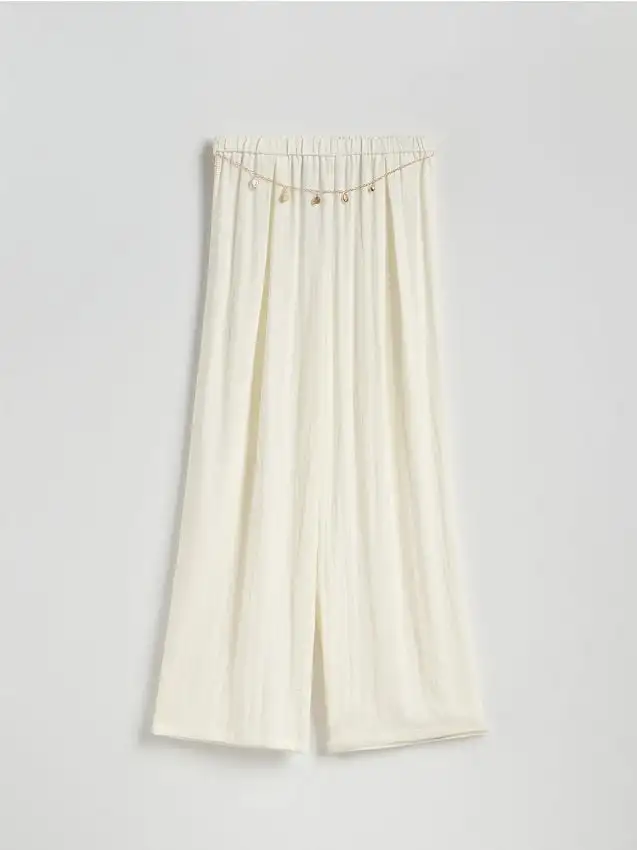 Pantaloni ampi con catena Colore panna