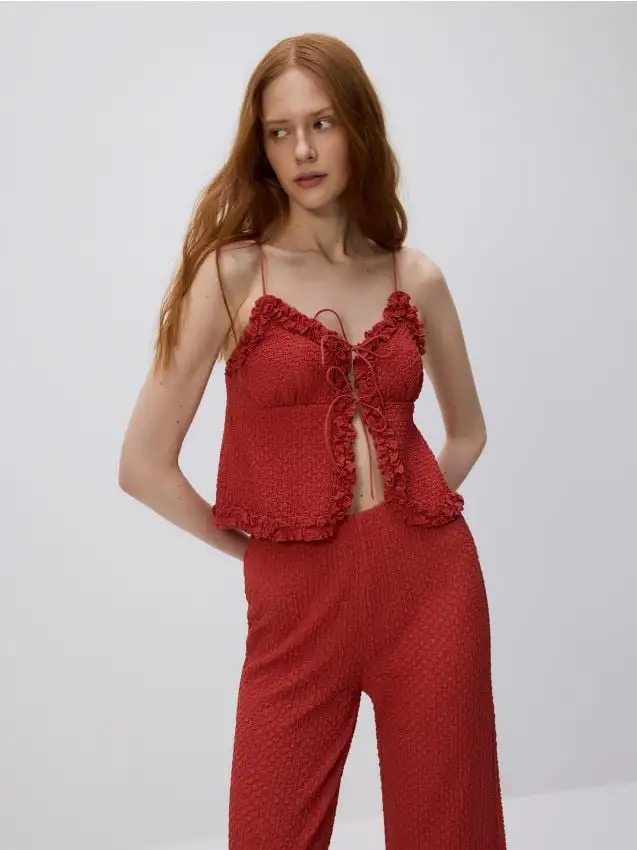 Top in maglia con spalline Colore carminio