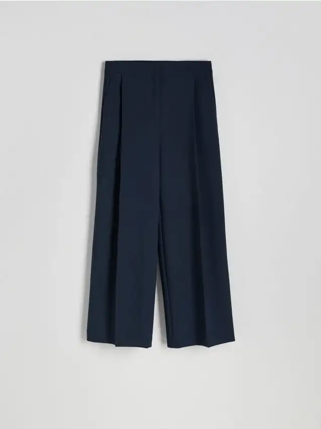 Pantaloni a gamba ampia con piega stirata Colore blu scuro