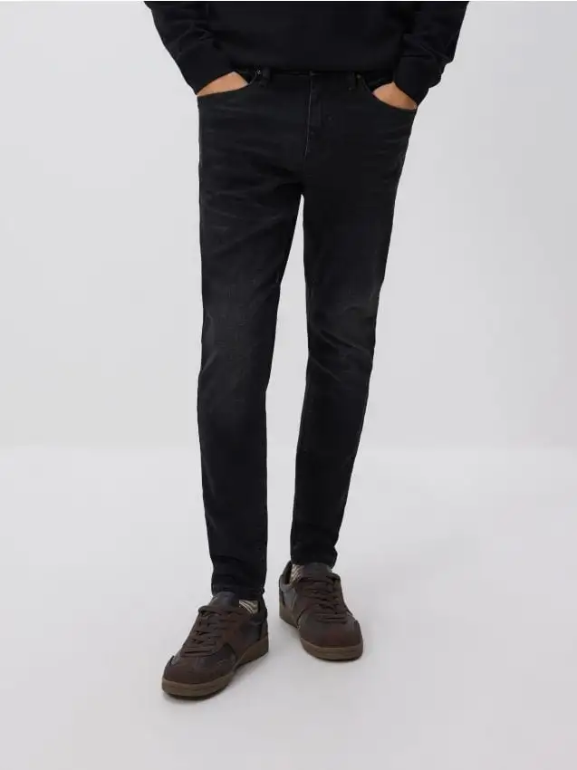 Jeans skinny con effetto slavato Colore nero