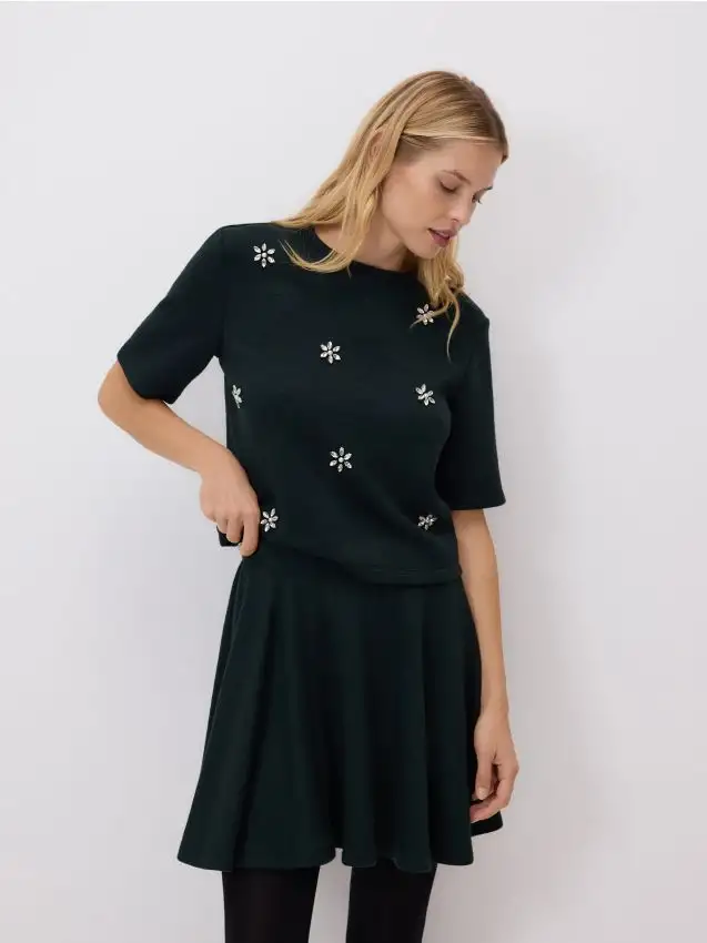 Minigonna con volant Colore verde petrolio