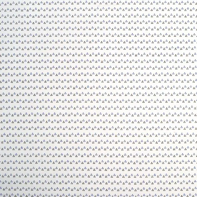 Tessuto popeline triangoli a pois