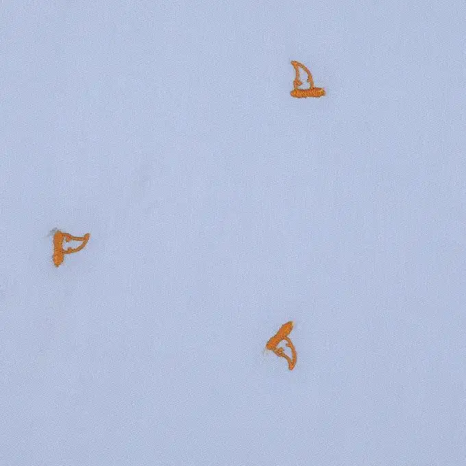 Tessuto viscosa blu ricamato testa di cane