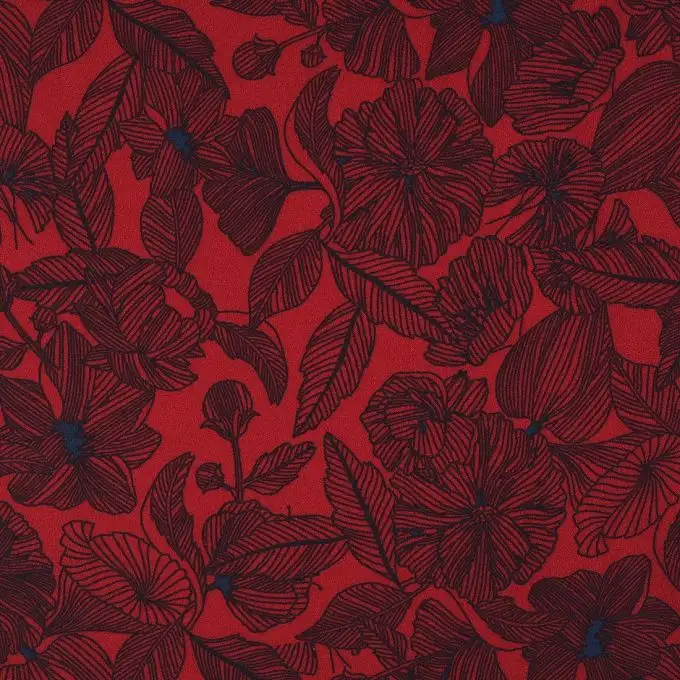 Tessuto crêpe rosso stampato fiori
