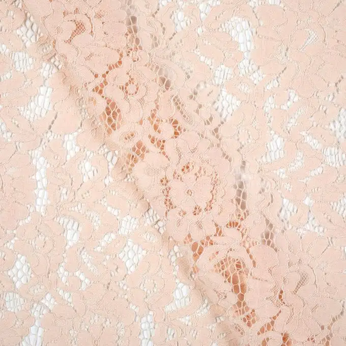 Tessuto pizzo cablato rosa nude