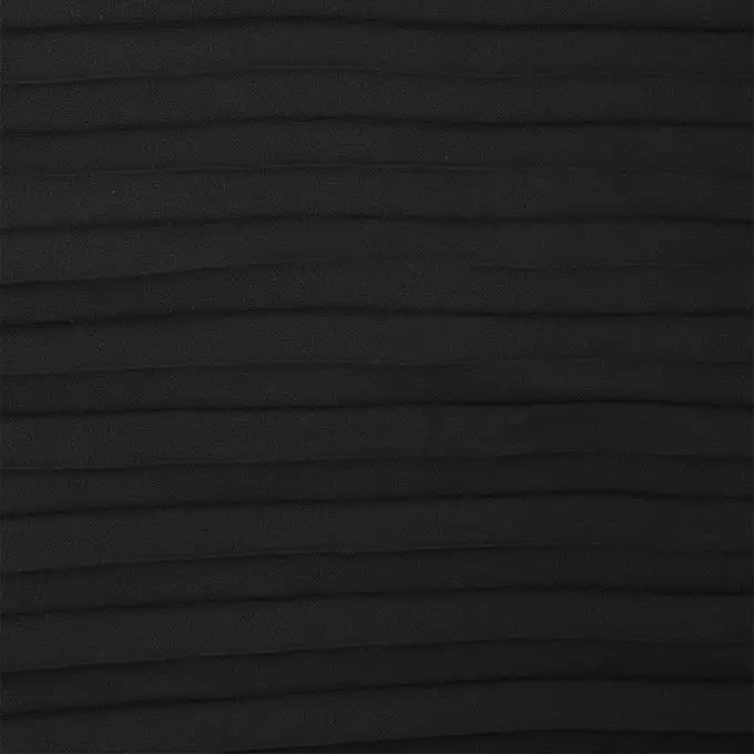 Tessuto crêpe plissettato nero