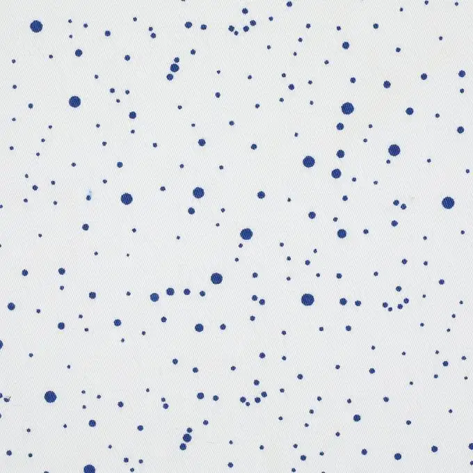 Tessuto jeans elasticizzato bianco pois blu