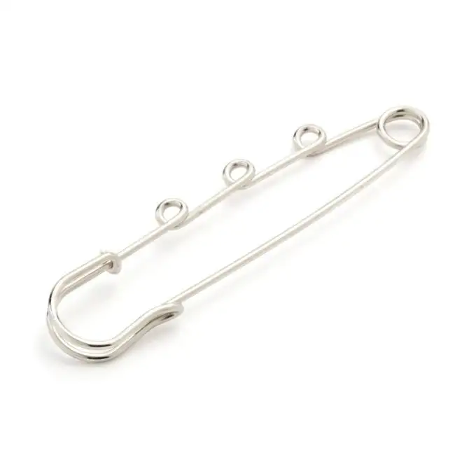 Spilla kilt argento a volute