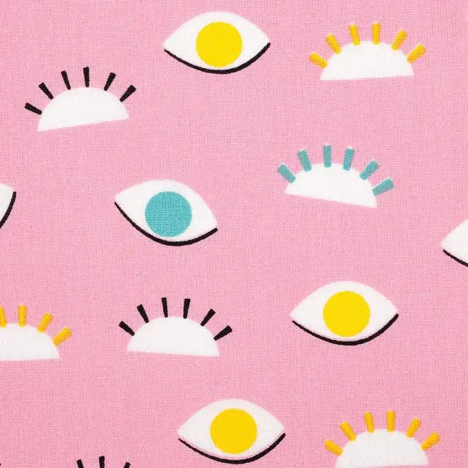 Tessuto cotone rosa stampato occhi