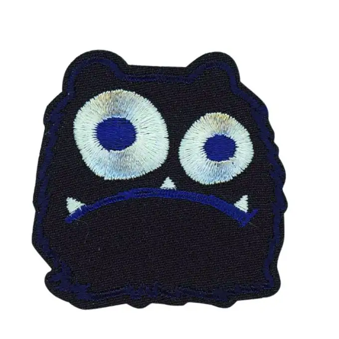 Distintivo mostro blu marino