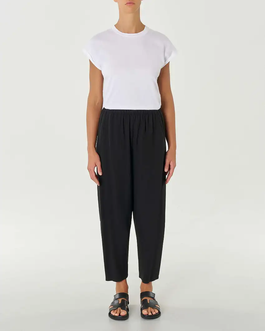 Pantaloni neri in viscosa e lino dalla linea a pagliaccio