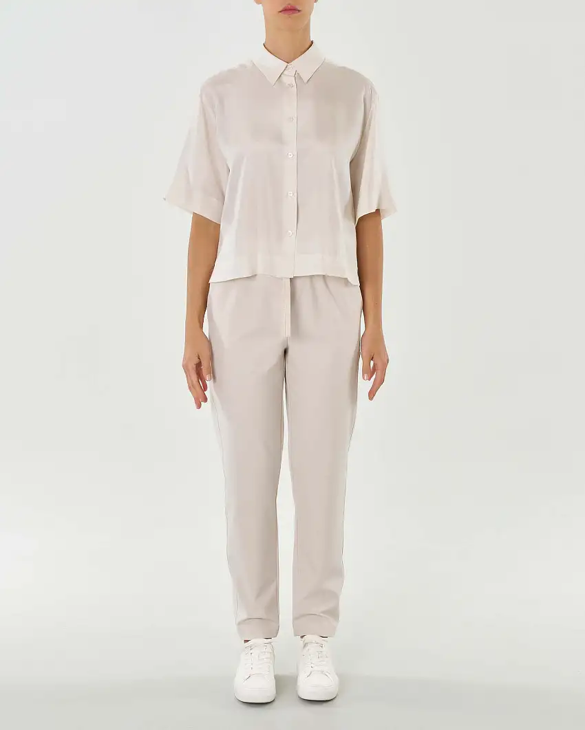 Pantaloni color gesso in tela di misto viscosa con elastico e coulisse inseriti in vita Linea MONOCHROME