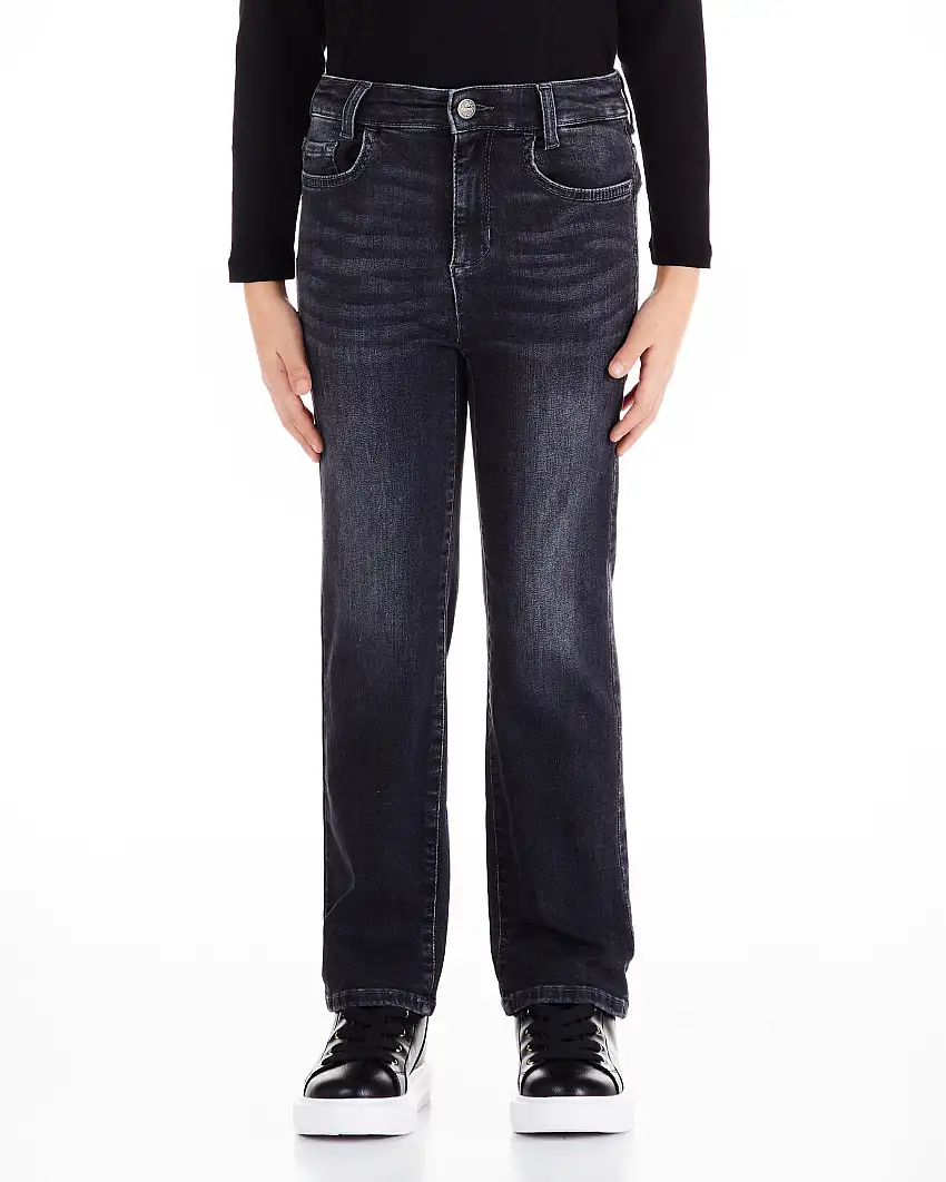 Jeans slim a vita media nero lavato in cotone stretch con schiariture e baffature