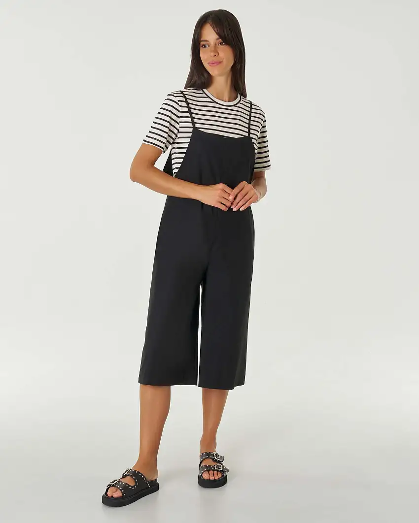 Tuta intera nera dalla linea ampia cropped in puro cotone con spalline sottili