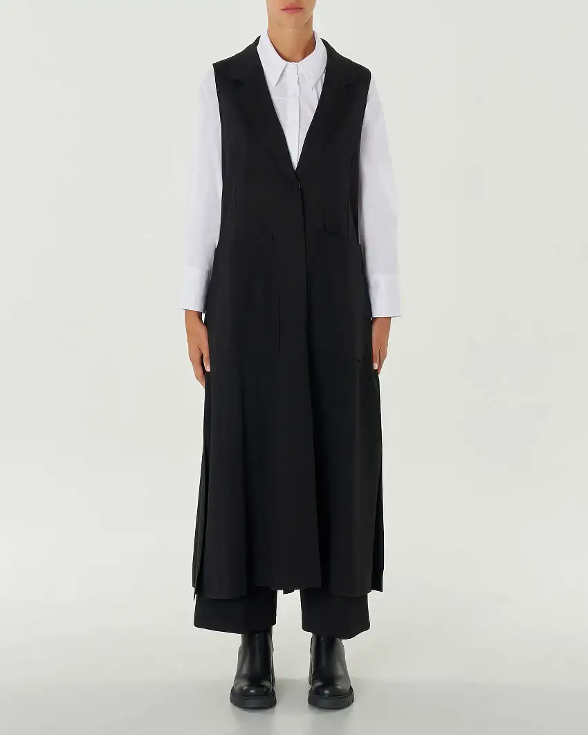 Gilet lungo nero in tricot di viscosa senza maniche con scollo a rever