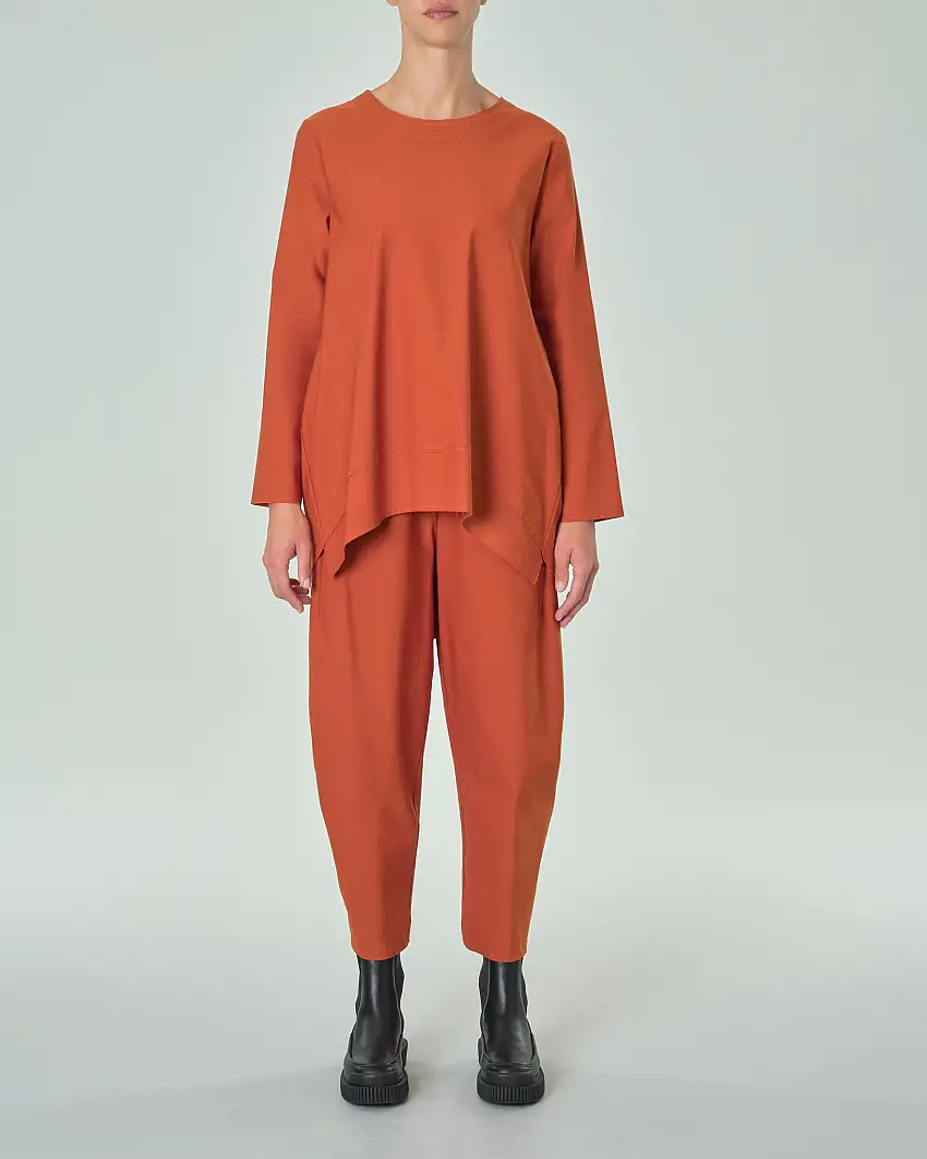 Pantaloni arancioni in misto viscosa stretch dalla linea a pagliaccio con elastico in vita