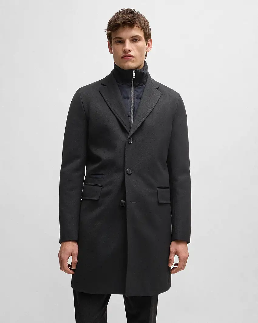 Cappotto Hyde nero in panno di lana idrorepellente con davantino staccabile