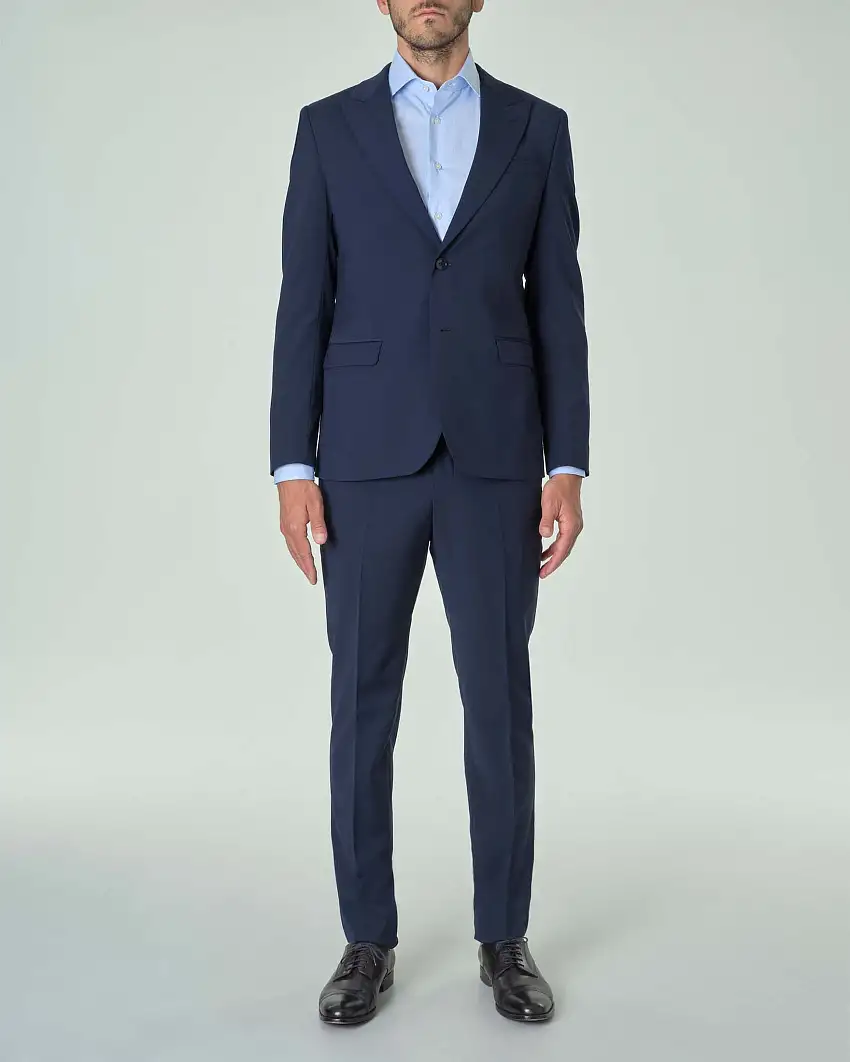 Abito Paul Baker blu in tela di lana stretch con rever a lancia