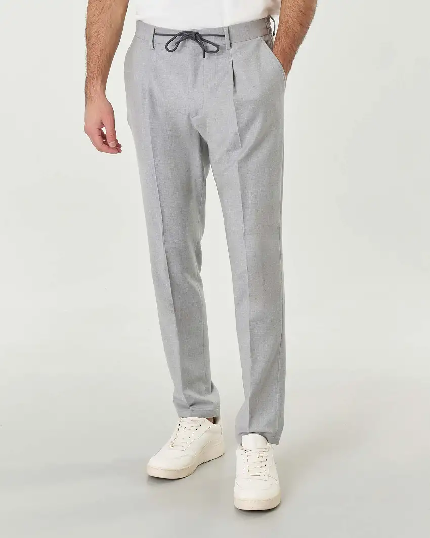 Pantalone grigio slim-fit in flanella di lana stretch con coulisse in vita e pinces frontali