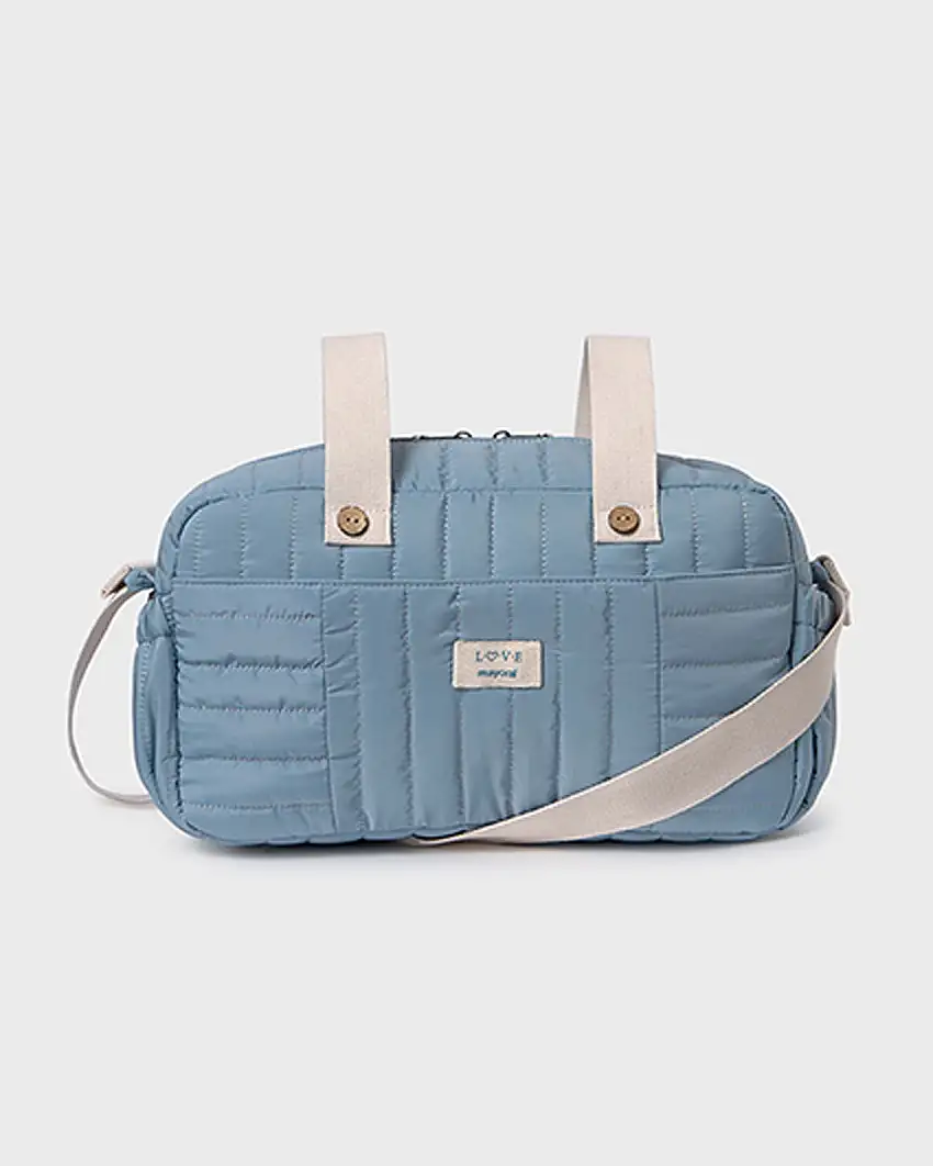 Borsone a mano azzurro in tessuto lucido trapuntato con tracolla