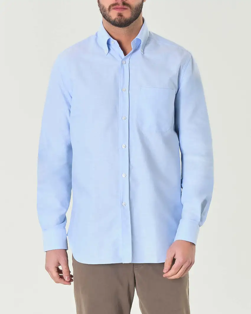 Camicia azzurra in Oxford di puro cotone con colletto button-down e taschino