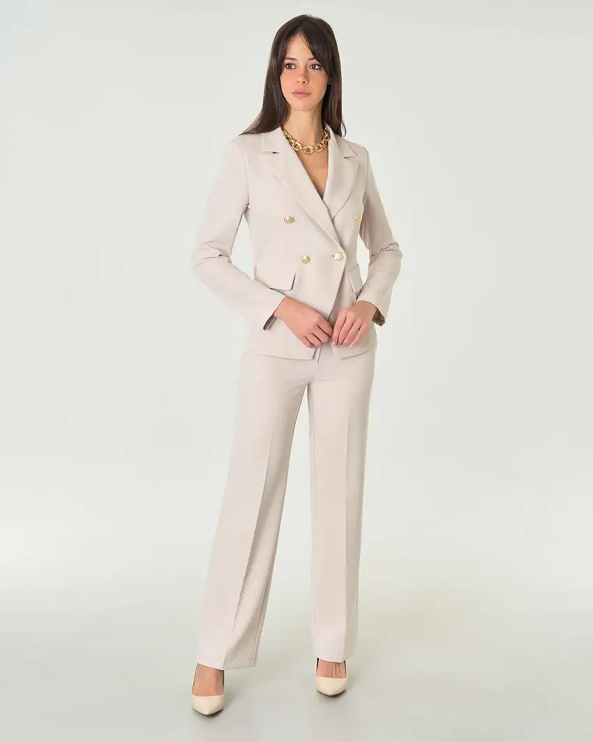 Pantaloni staight color burro in tessuto tecnico stretch