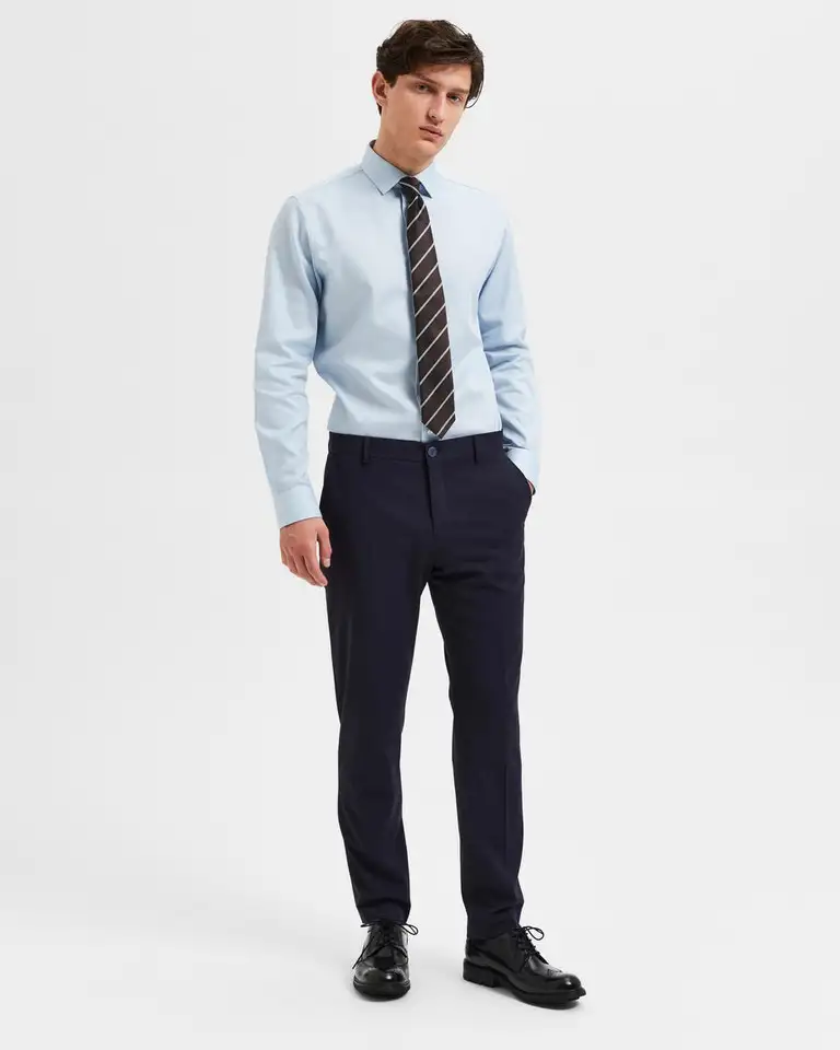Pantaloni slim blu in tela di misto viscosa stretch