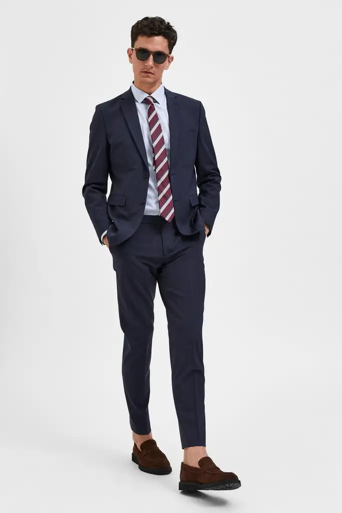 Pantaloni slim blu in tela di misto lana stretch