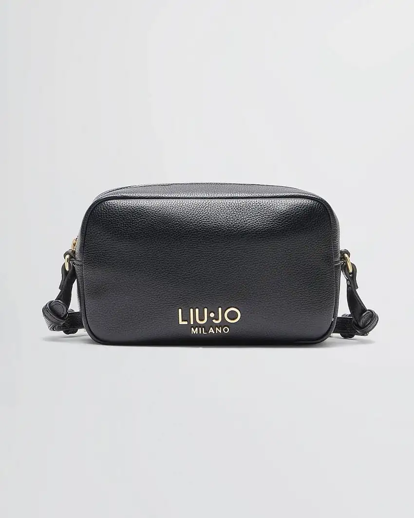 Cross-bag nera in similpelle bottalata con logo in metallo frontale e tracolla con borchie applicate