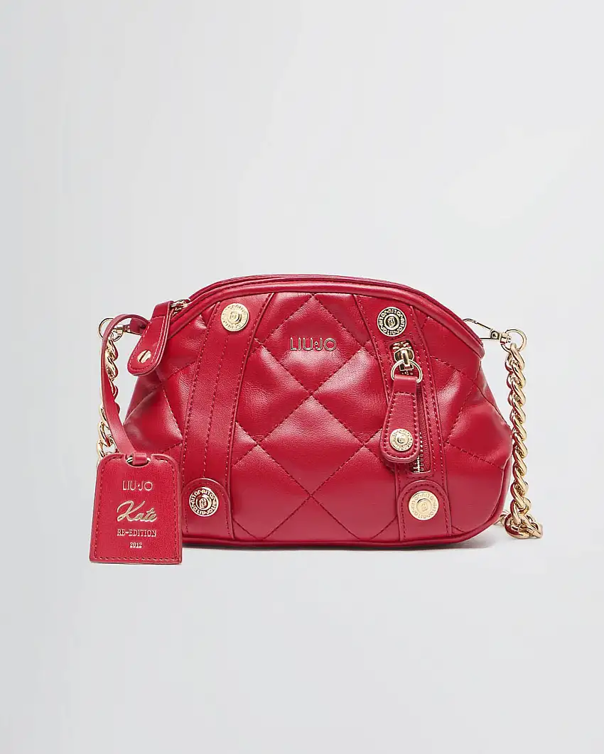 Borsa Kate a tracolla rossa misura piccola in pelle matelassé logo in metallo e charm frontale