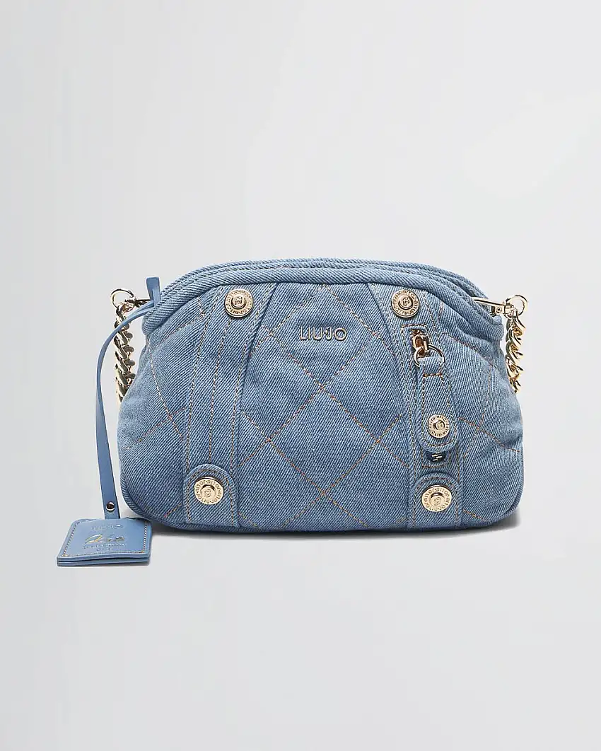 Borsa Kate a spalla misura piccola in denim lavaggio chiaro matellassé logo in metallo e charm frontale