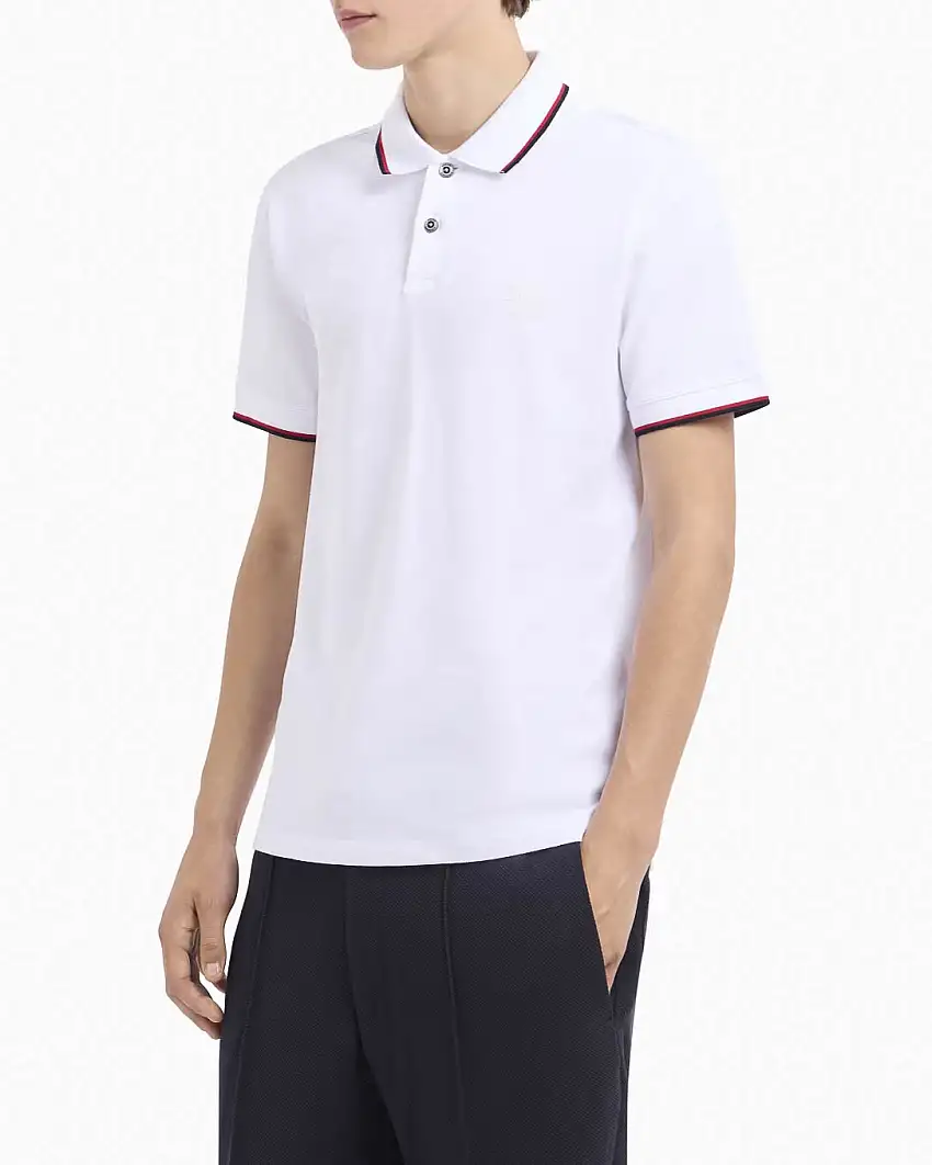 Polo bianca in piquè di cotone con bordino rosso e blu