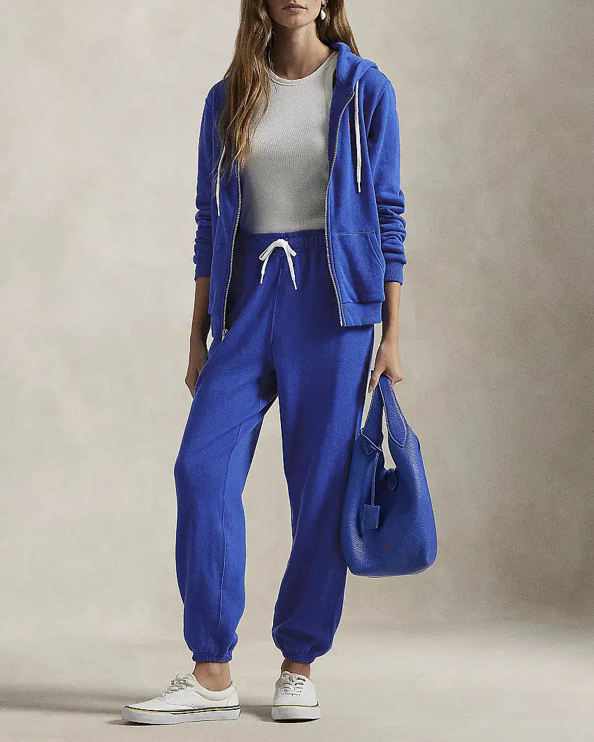 Pantaloni blu royal in felpa di cotone garzato con elastico al fondo e logo rosso ricamato