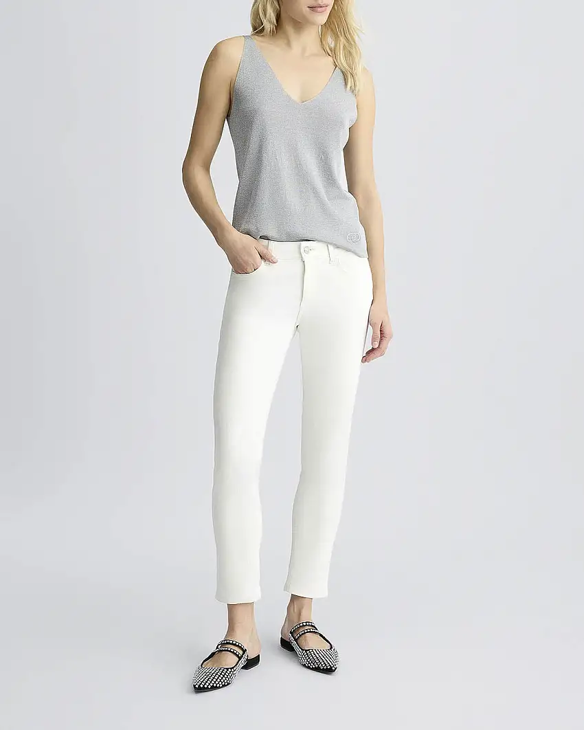 Pantaloni skinny bianchi in drill di cotone con risvolto al fondo con motivo a monogram in strass